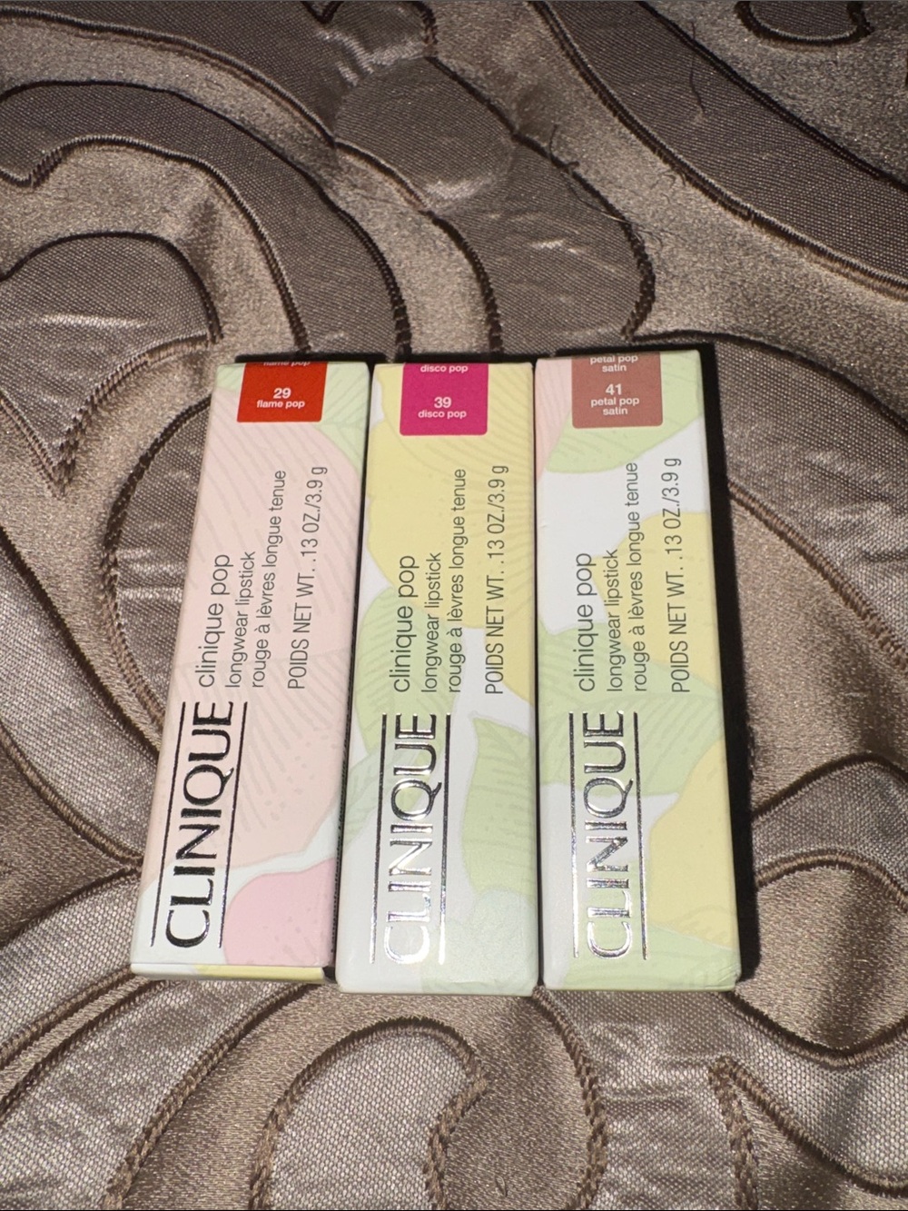 Clinique Pop Longwear Lipstick Trio in Flame Pop, Disco Pop, Petal Pop